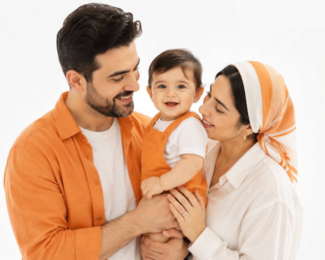 Family portrait of parents with child wearing orange and white